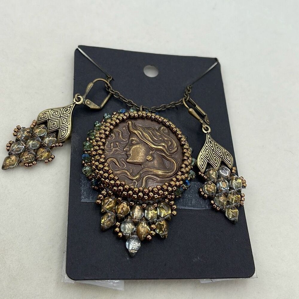 Vintage repurposed Artisan made necklace earrings set.
